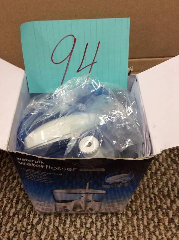 lot 94 image: Waterpik waterflossser open box