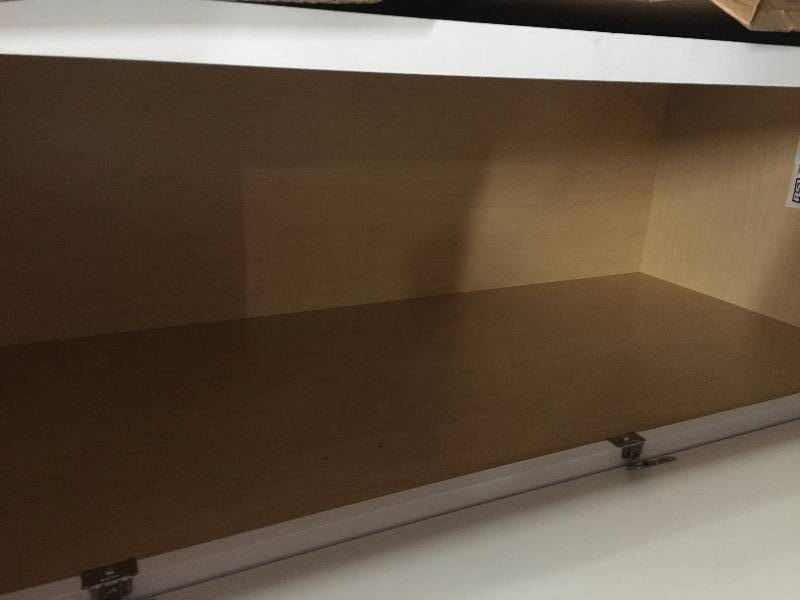lot 43 image: Hampton Bay Shaker Assembled 18 x 84 x 24 in. PantryUtility Kitchen Cabinet in Satin White damaged