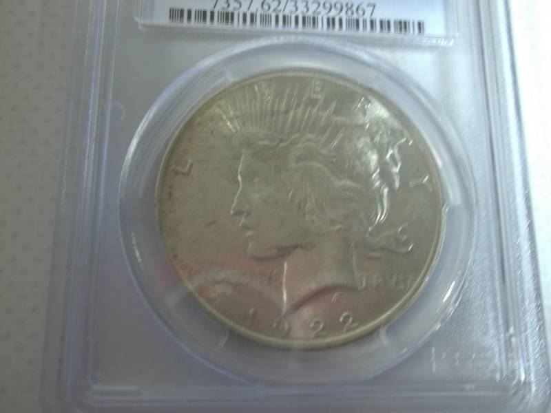 lot 19 image: 1922 Peace Dollar Graded MS62