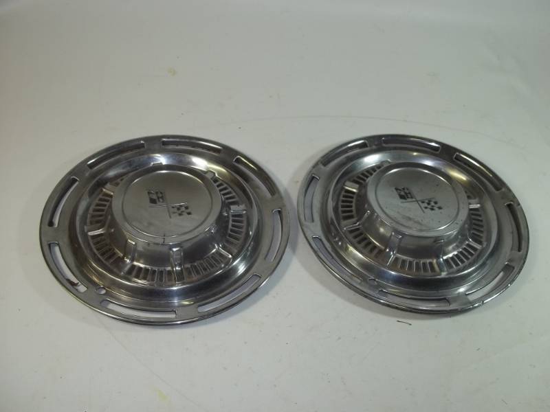 lot 125 image: Pair of 59 - 60 Chevy Hubcaps