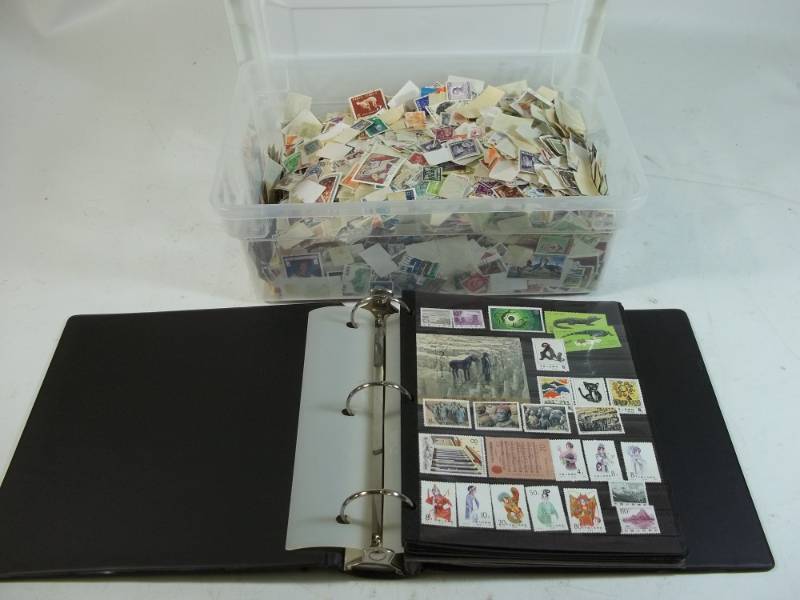 lot 252 image: Stamps in Binder with 12 Quart Tote of Stamps