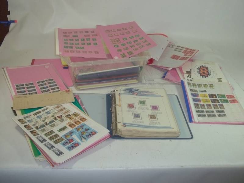 lot 254 image: Stamps in Binder with 12 Quart Tote of Stamps