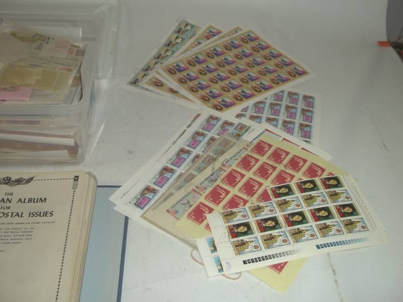 lot 255 image: Stamps in Binder with 12 Quart Tote of Stamps