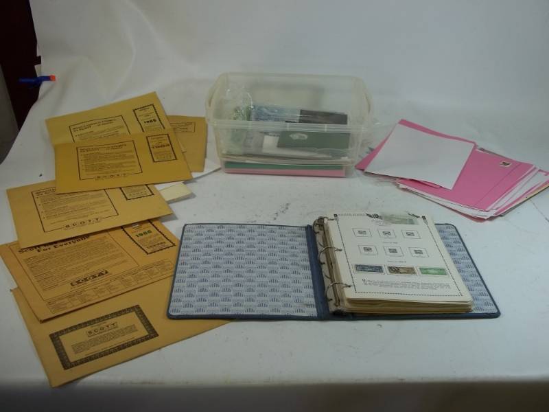 lot 256 image: Stamps in Binder with 12 Quart Tote of Stamps