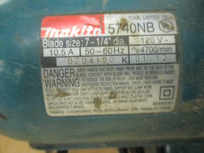 lot 23 image: Makita Saw, Fishtape, Light
