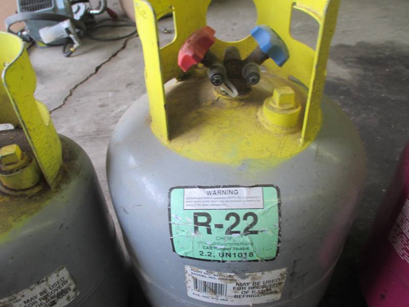 lot 61 image: Partial Bottles of Coolant