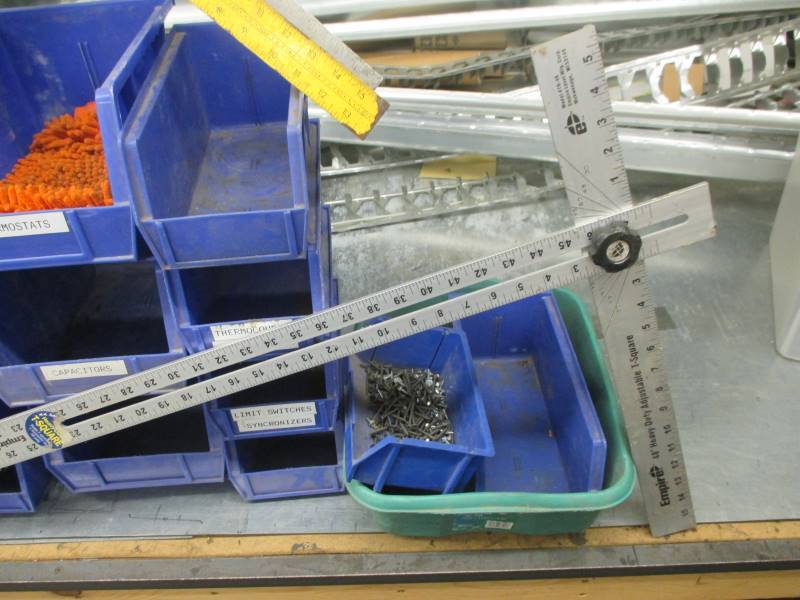 lot 97 image: Parts Bins, T Square, (2) 2 Squares, Shrink Wrap