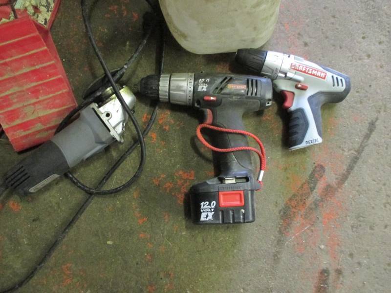 lot 134 image: Cordless Drills, Grinder, Gas Cans, Floor Sweep
