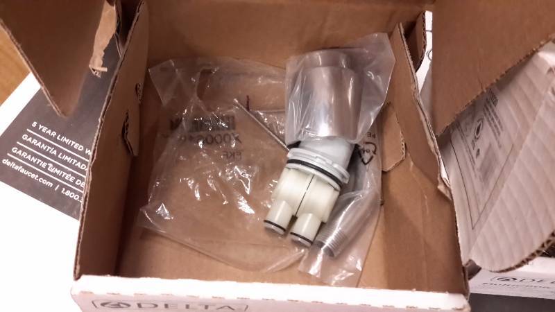lot 159 image: Lot of Delta Plumbing Fixtures as shown