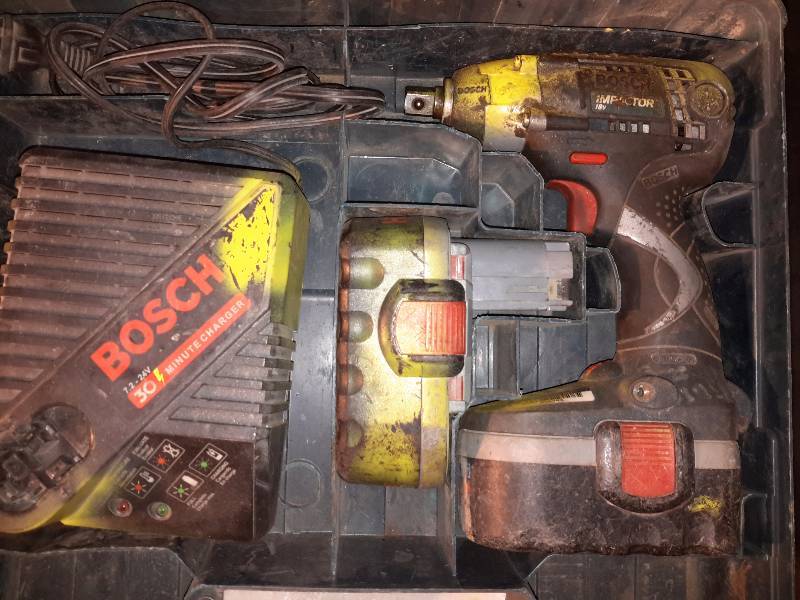 lot 217 image: BOSCH Impact Wrench.. Charger and  2 batteries