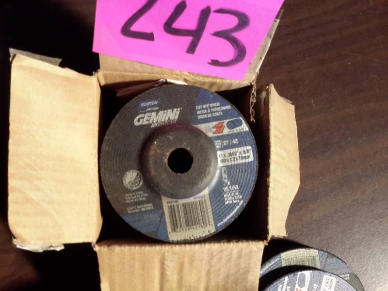 lot 243 image: large lot of 4in x 18 in Grinding Wheels.