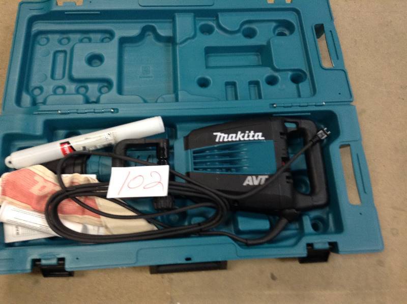 Makita HM1214C 27.1-Pound Demolition Hammer not used Retails for $900