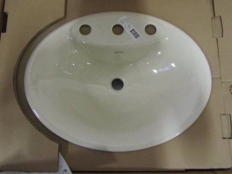 lot 66 image: KOHLER Maratea Drop-In Cast Iron Bathroom Sink in Almond