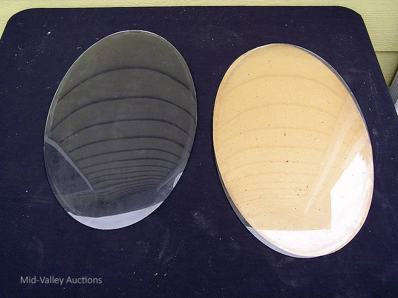 Oval curved glass