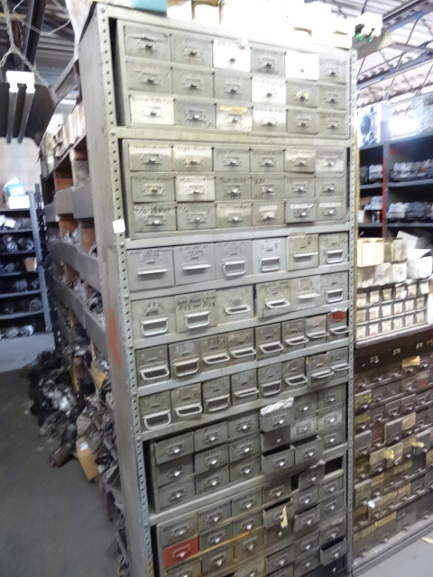lot 69 image: Metal Shelving Unit With Hardware Bins Inside.