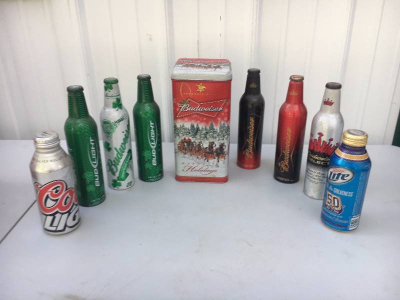 lot 101 image: Bud Light Collector Bottles and Tin
