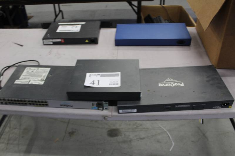 lot 41 image: Lot of (3) Computer Hardware Includes HP ProCurve Switch Model 2610-2412PWR SN J908GA AND 1) Cisco BBB Model PIX Series AND 1) 1-More