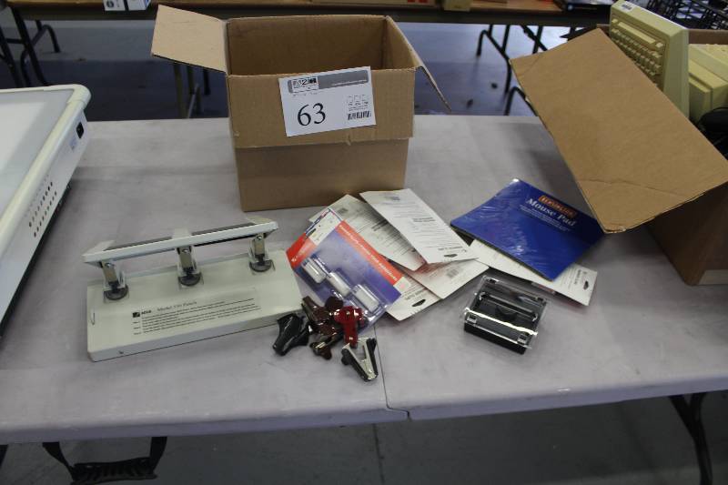 lot 63 image: Office Supplies Includes Acco 3-Hole Punch, Staple Removers, Marker Clips, And More