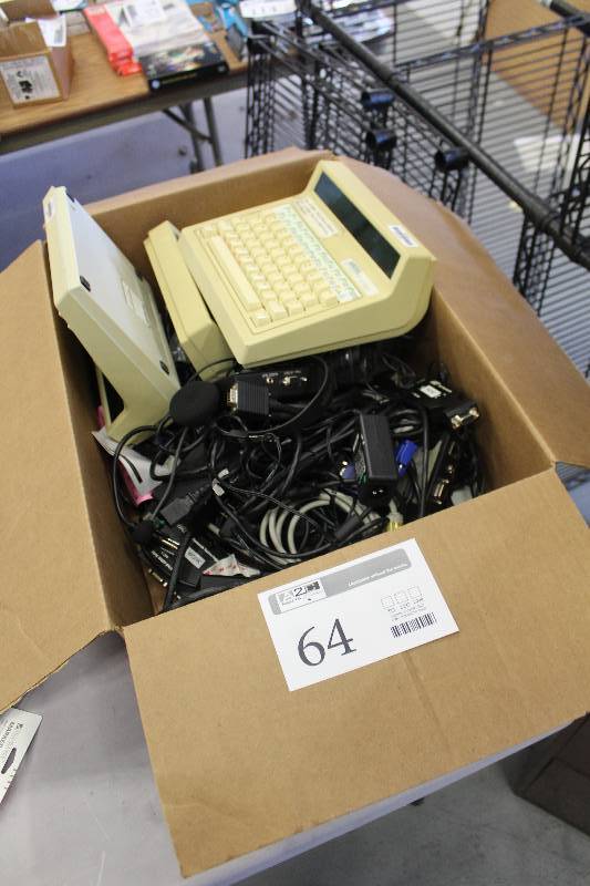 lot 64 image: Box Lot of Phone Equipment Includes Amtel Direct Line, Headsets, And More