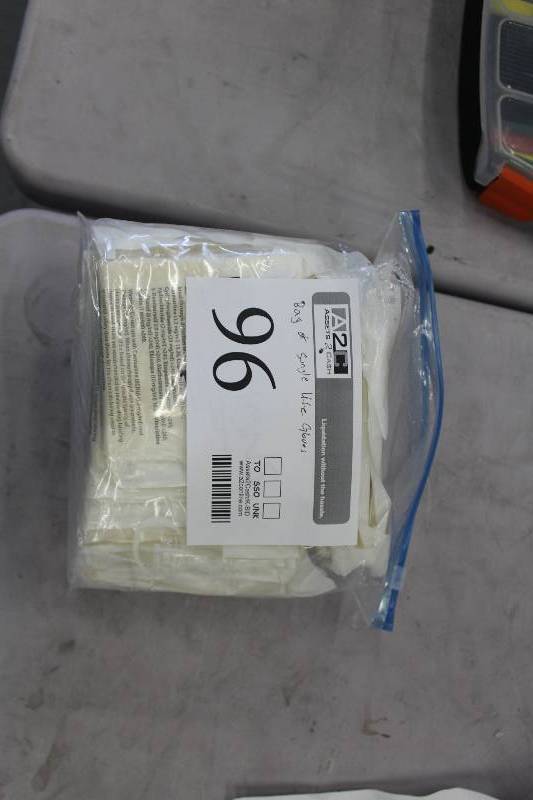 lot 96 image: Bags of Protexis PI Sterile Polyisoprene Powder-Free Single Use Surgical Gloves