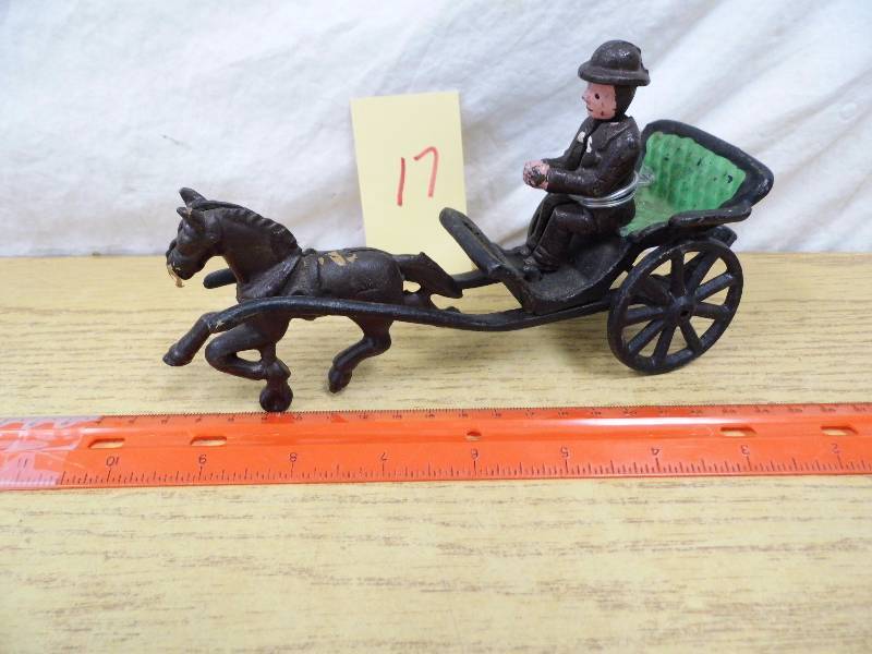 lot 17 image: Cast Iron Buggy