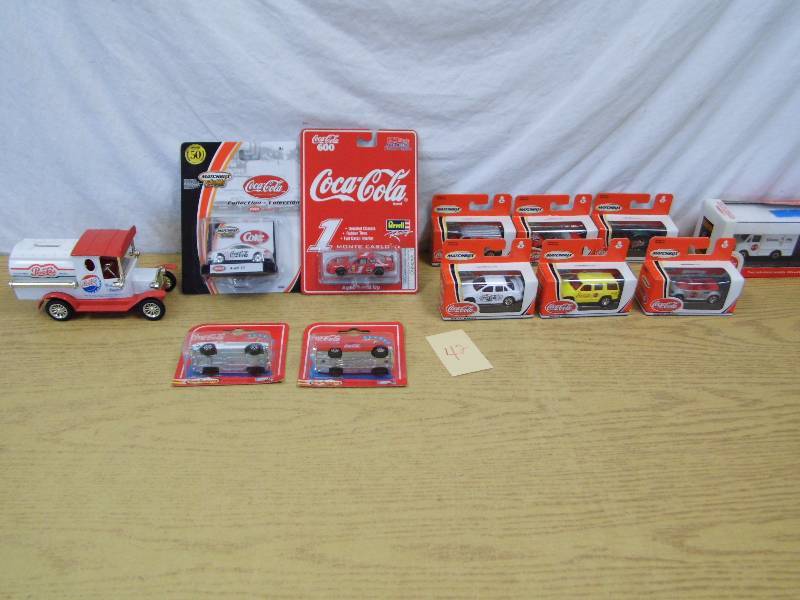 lot 42 image: Matchbox - Coke - Pepsi Bank