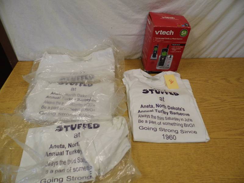 lot 86 image: Phone - T-Shirts
