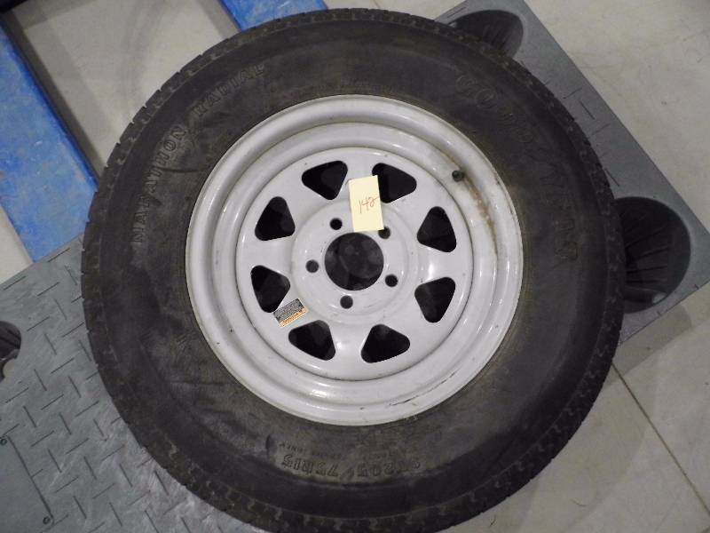 lot 142 image: Tire w Rim