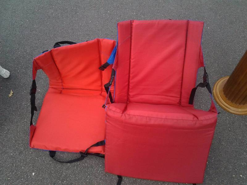 lot 15 image: 2-Stadium Seat Cushions (1-Large, 1-Small)