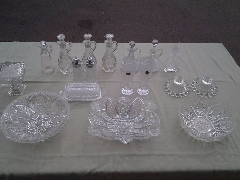 lot 18 image: Collection Of Crystal, Cut Glass, Cruets, Candle Sticks, Candy Dish, Butter Dish