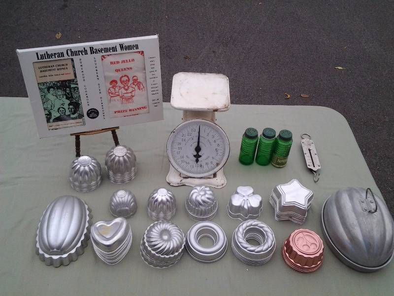 lot 26 image: Collectible Church Basement Women Gift Set (Cook Book & Towel), Jello Molds