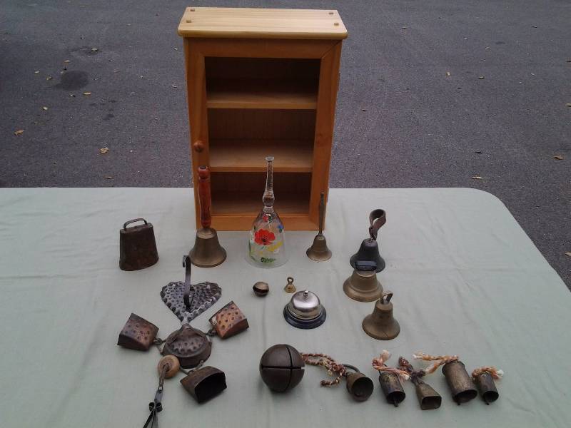 lot 33 image: Collection Of Vintage Bells, Wind Chime Marked Switzerland, Pine Wall Cabinet 12x7x17