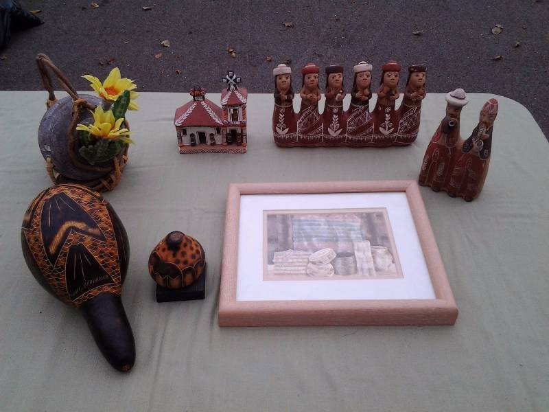 lot 39 image: Framed Print By Helen Paul Desert Weavings, Pottery Figurine Flutes & Gourds Made In Peru