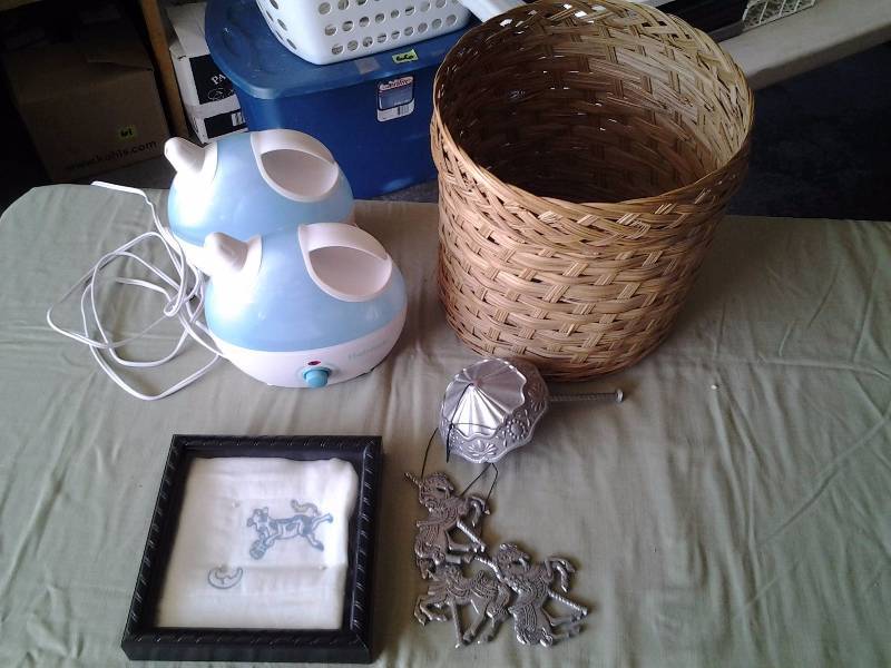 lot 72 image: 2-Steamers, Basket, Carousel Horse Wind Chime, Vintage Baby Blanket In Frame