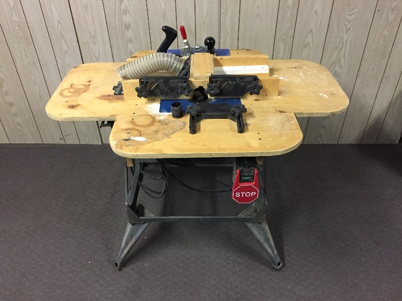 lot 63 image: Black & Decker Work Table with 2 Router Bases Attached