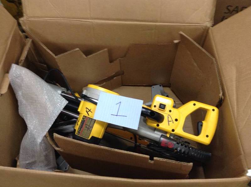 DWS780 12 Double Bevel Sliding Compound Miter Saw has a 15 Amp motor and integrated XPS cross cut positioning system missing blades and no fences used in like new condition