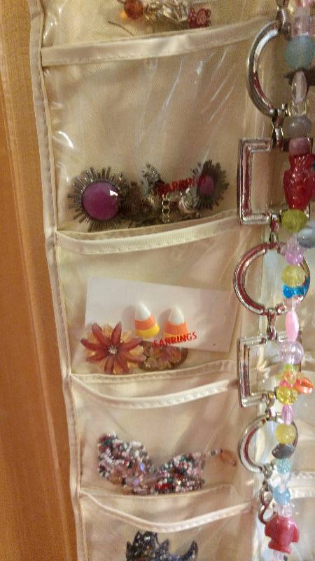 lot 78 image: Lot of vintage Costume Jewelry as pictured.. Includes pouch