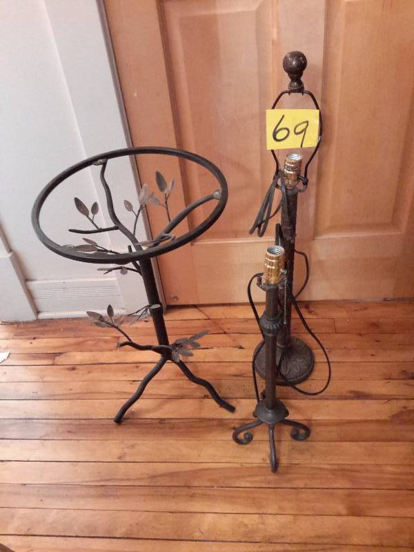 lot 69 image: Round metal wrought Iron type of table.. No top  2, lamps.. No shades