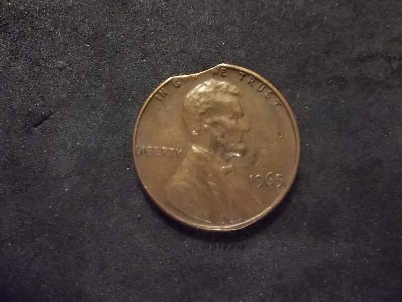 1965 Lincoln Error Strike Coin