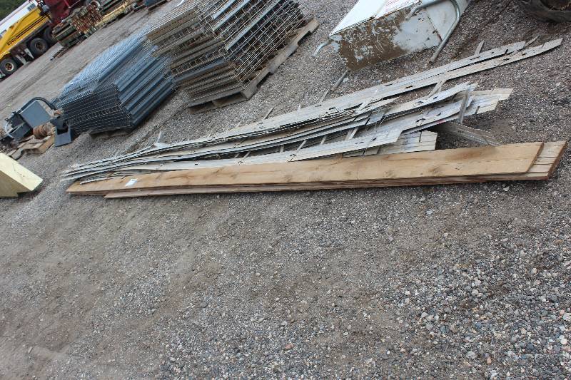 lot 50 image: Lot of (Approximately 20) 15-Aluminum 4in. Garden Edging, 5-Support Boards 1x8in. Cedar Siding