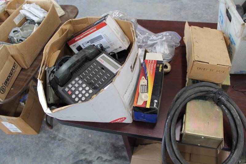 lot 217 image: Telephone Equipment Includes Headsets, USB Modem, Cables, Power Strips, And More
