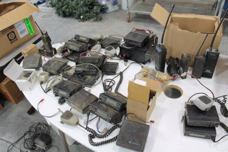 lot 219 image: Table Lot of Truck Radio Equipment, Microphones, Walkie Talkies