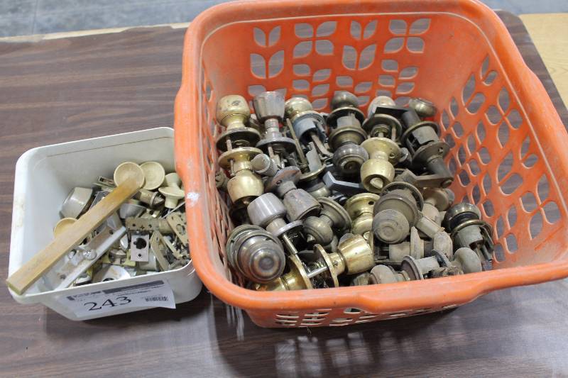 lot 243 image: Bin Lot of Door Knob Sets