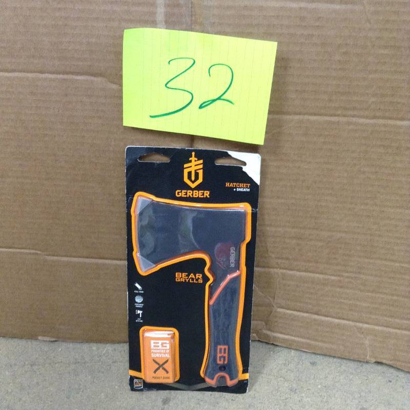 lot 32 image: Never used Gerber Bear Grylls Survival Hatchet