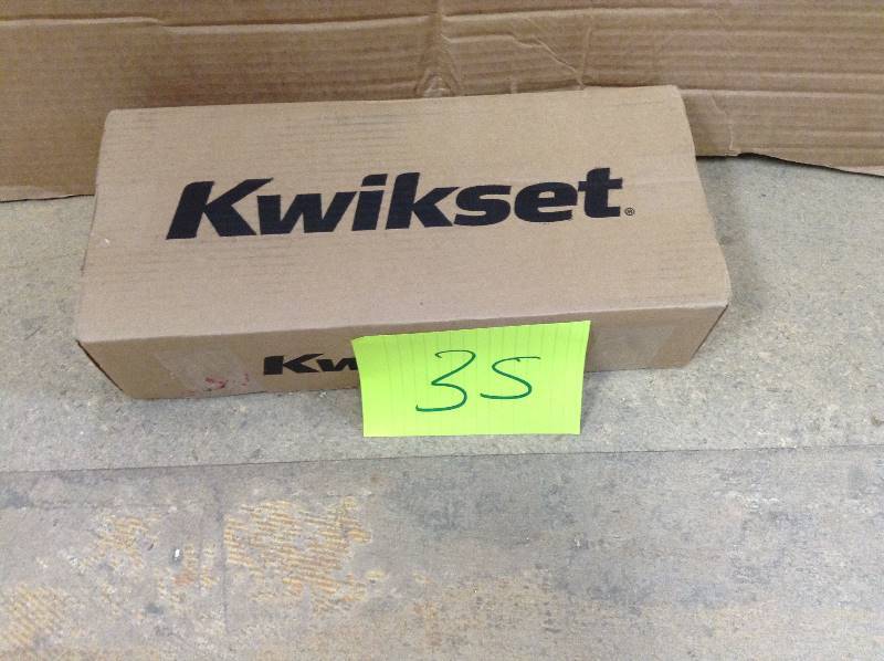 lot 35 image: Never used Kwikset Arlington Single Cylinder Antique Brass Handleset Less Interior Pack featuring Smartkey
