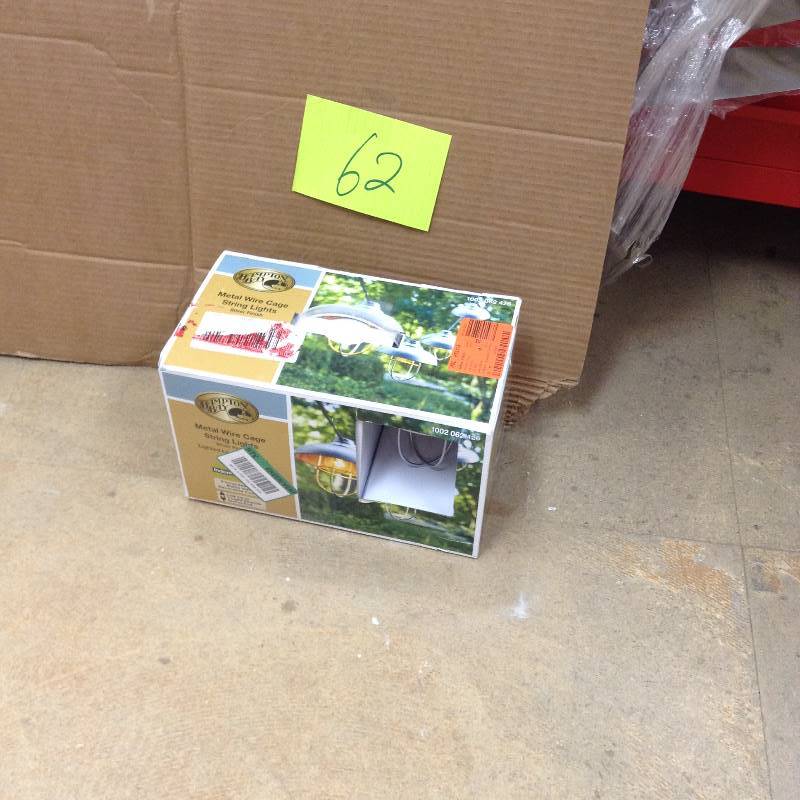 lot 62 image: never used Hampton Bay 8-Light Hood and Cage Outdoor Hanging Cafe String Light