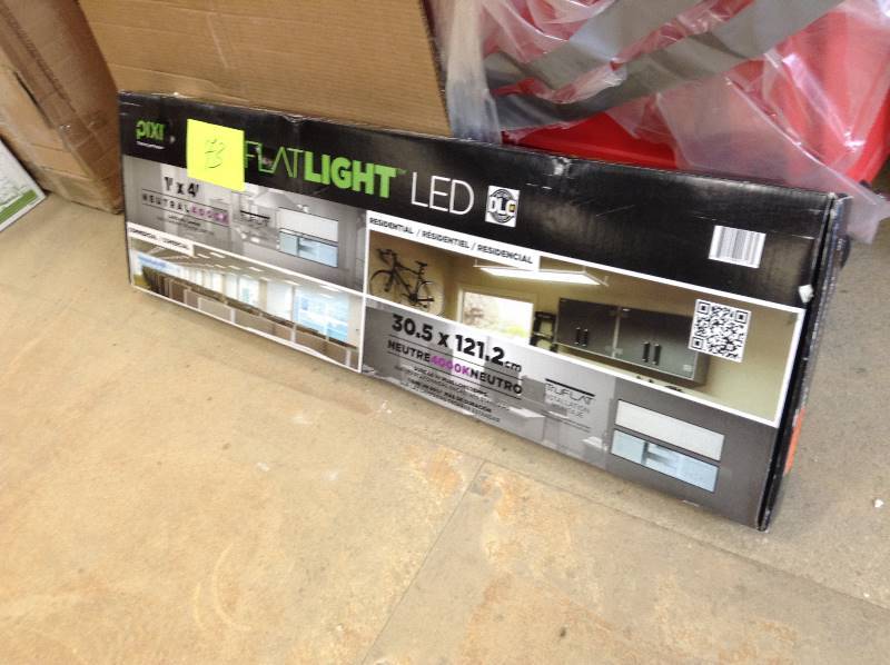 lot 73 image: never used Pixi 1 ft. x 4 ft. Edge-Lit LED FlatLight Luminaire