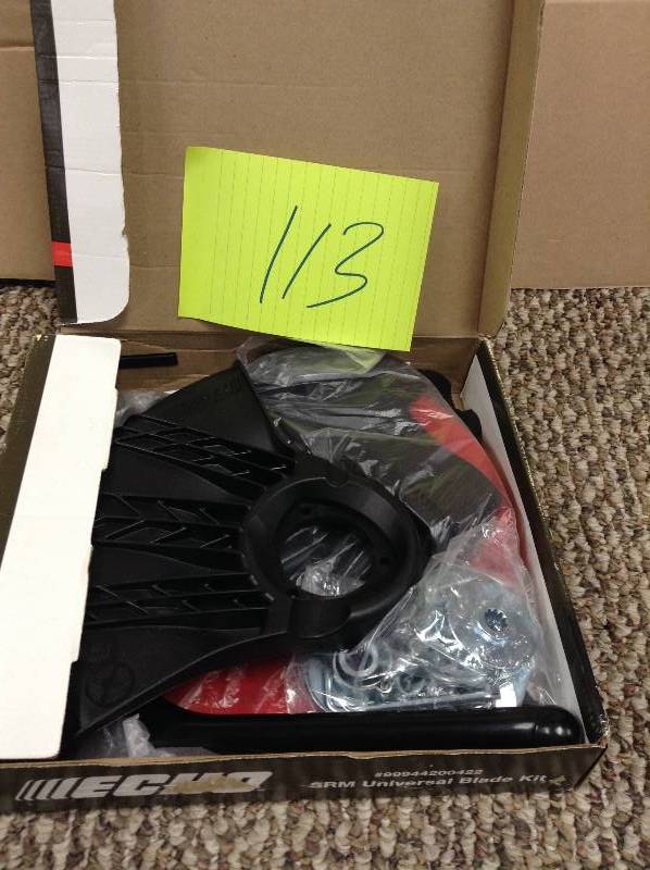 lot 113 image: never used ECHO 8 in. x 8-Tooth Grass Blade and 20mm Blade Kit for Echo