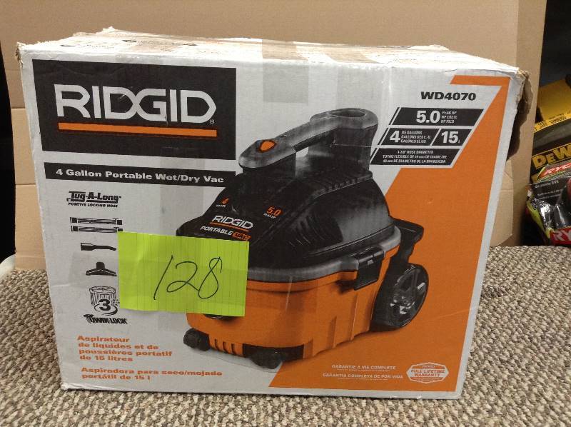lot 128 image: never used RIDGID 4 gal. 5.0-Peak HP Portable Wet Dry Vac