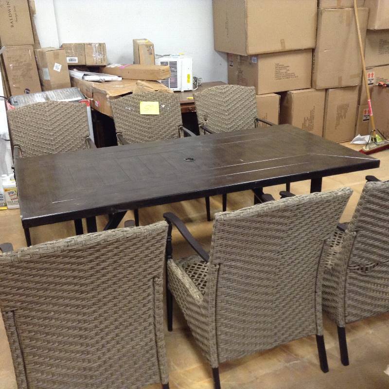 lot 59 image: Used Outide patio table long large with 6 chairs wicker brown wood